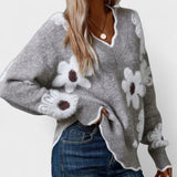 Ema - Elegantni pulover s cvjetnim motivom