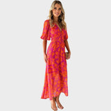 Ranka - Cvjetna midi haljina s puf rukavima i V-izrezom