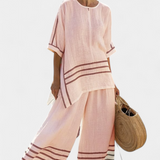 Salopeta s širokim prugama i asimetričnim rezom - moderno i udobno stil